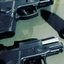 Duas armas e munição que foram apreendidas pela PM