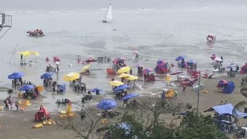 Vendaval espanta turistas na praia da Enseada, em Bertioga - Reprodução