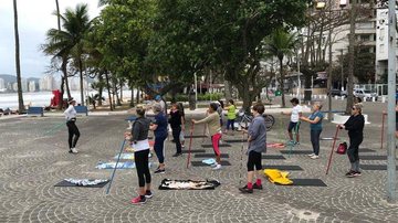 Imagem Aulas gratuitas de ginástica e alongamento em praias de Guarujá